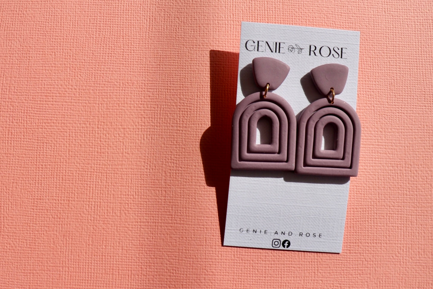 Extruded arch statement earring in lilac