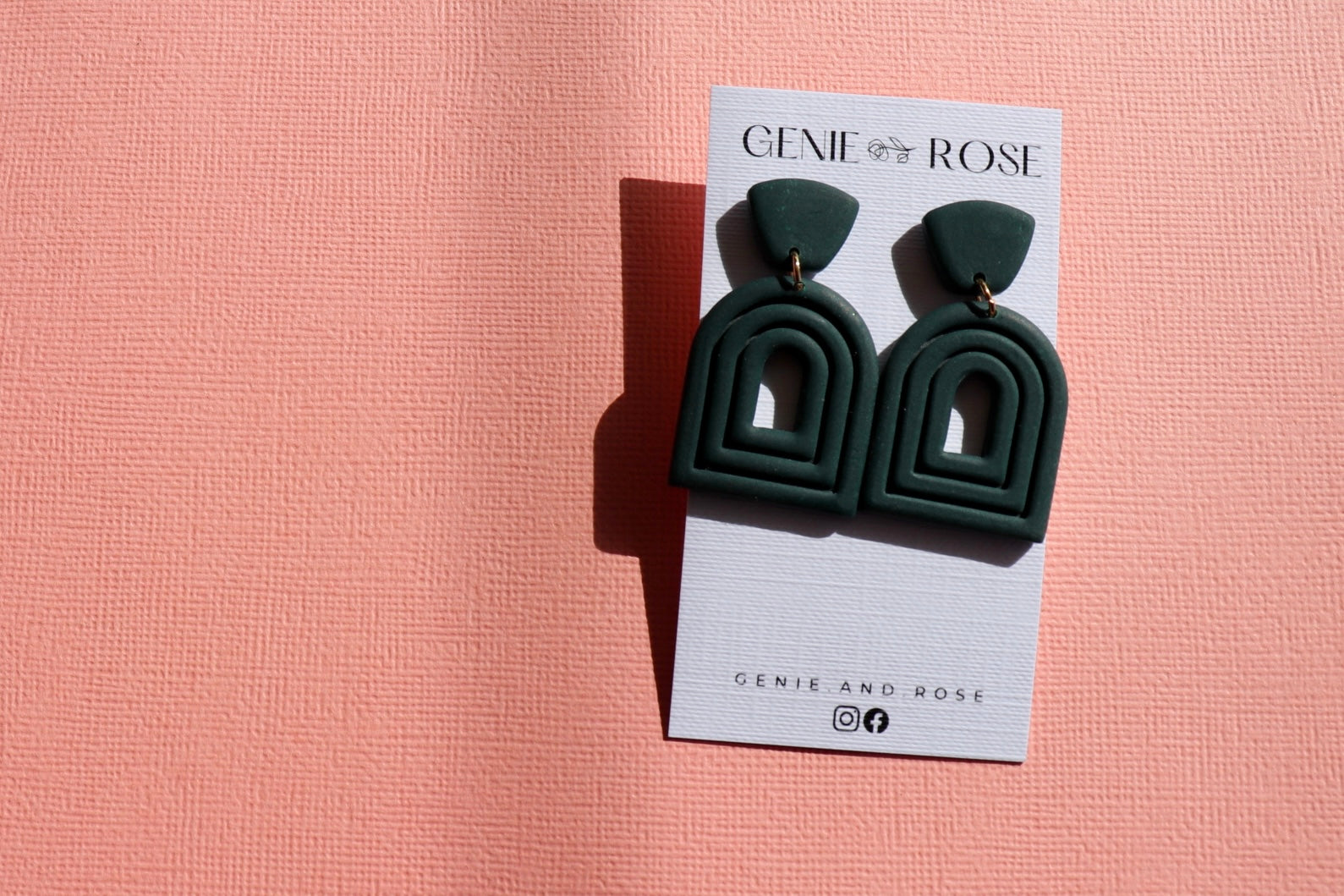 Extruded arch statement earring in dark teal